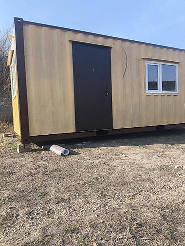 продаю вагончик: Мобильный контейнер серого цвета, выполненный из прочного материала — 8