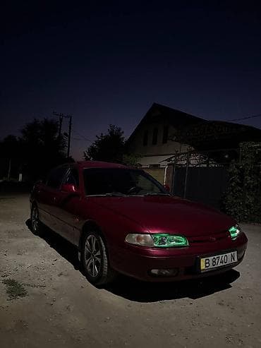 ravon spark: Mazda Cronos: 1996 г., 2 л, Механика, Бензин, Хэтчбэк — 1