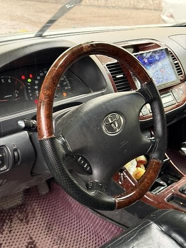 650: Toyota Camry: 2004 г., Газ — 10