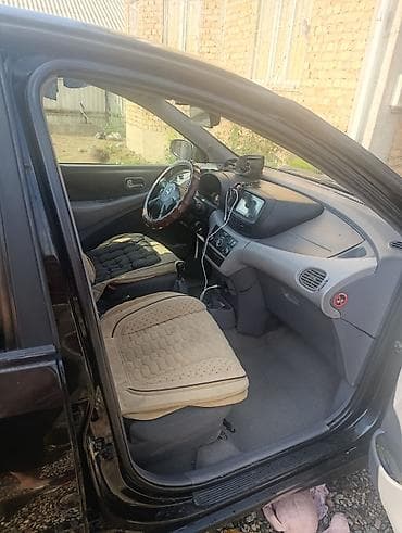 салон машина: Nissan Almera Tino: 2003 г., 1.8 л, Механика, Бензин, Хэтчбэк — 8