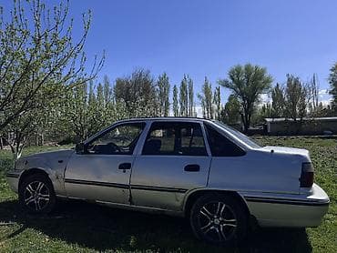 golf 2: Daewoo Nexia: 2003 г., Седан — 2