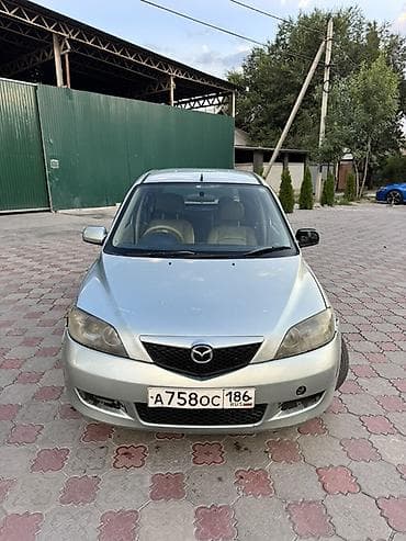 забыл: Mazda Demio: 2003 г., 1.3 л, Автомат, Газ, Хэтчбэк — 10