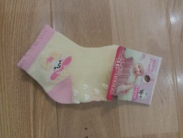 детский домашний тапочки: Продам детские носочки «РОЗА», кремово-розового цвета. На подошве — 1