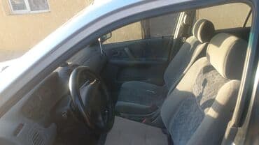 машина для полировки: Mazda 323: 1999 г., 1.5 л, Механика, Бензин — 4