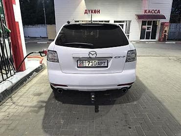 митцубиси кольт: Mazda CX-7: 2011 г., Кроссовер — 4