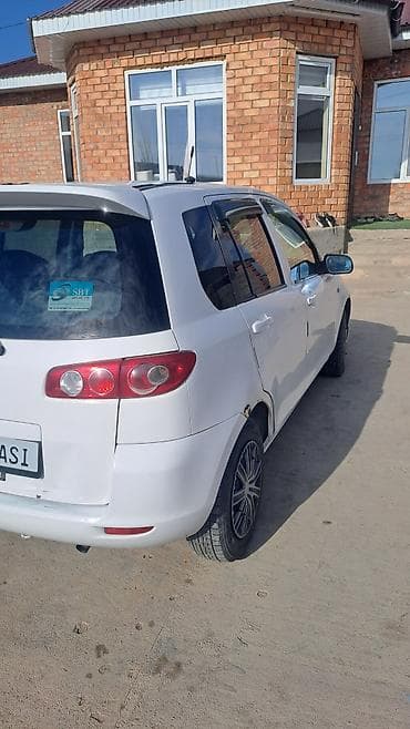 диск на авто: Mazda Demio: 2002 г., 1.3 л, Автомат, Бензин, Хэтчбэк — 3