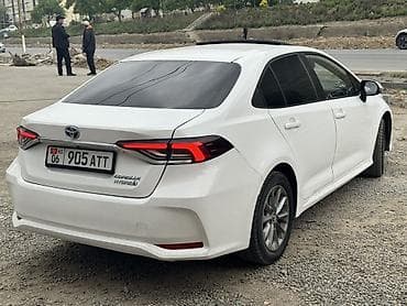 e6 3: Toyota Corolla: 2019 г., 1.8 л, Вариатор, Гибрид, Седан — 4