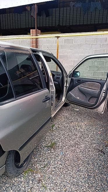 матор тайга: Toyota Raum: 2000 г., 1.5 л, Автомат, Бензин, Универсал — 4