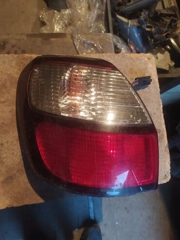 задние стоп: Задние фонари Субару Легаси Б4 Универсал — 1