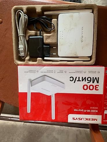 Модемы и сетевое оборудование: Продаю Wi-Fi роутер Tenda. • 4 мощные антенны • 2.4 GHz и 5 GHz • — 4