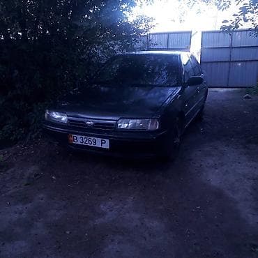 Nissan Primera: 1991 г., Механика, Седан — 4