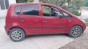 круглый: Mitsubishi Colt: 2006 г., 1.3 л, Механика, Бензин, Хэтчбэк — 4