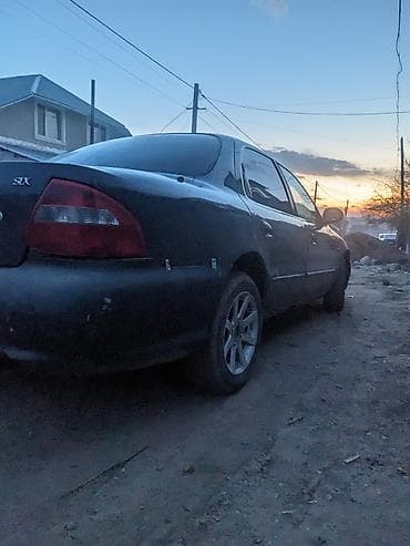 мисубиси спейс стар: Kia Clarus: 2000 г., 1.8 л, Автомат, Седан — 5