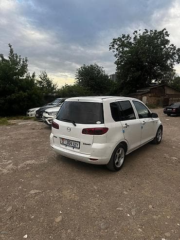 mini v: Mazda Demio: 2004 г., 1.3 л, Автомат, Бензин, Седан — 3