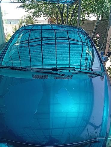 e2 byd: Компактный хэтчбек синего цвета. Основные характеристики по фото: - — 2