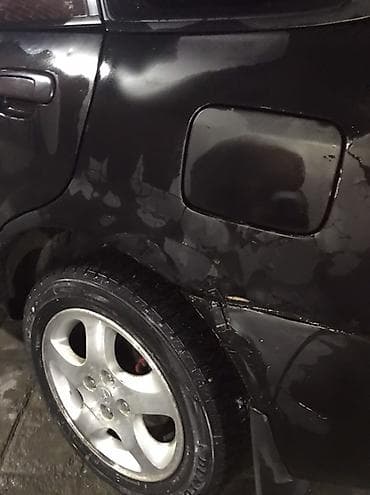 bmw e34 1995: Mazda Familia: 2001 г., Универсал — 5