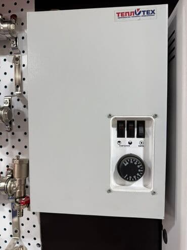 электро радиаторы: Навесной электрический котел «Теплотех» в белом металлическом корпусе — 1