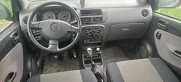 5: Daihatsu Cuore: 2004 г., 1 л, Ручные, Бензин, Хэтчбэк — 7