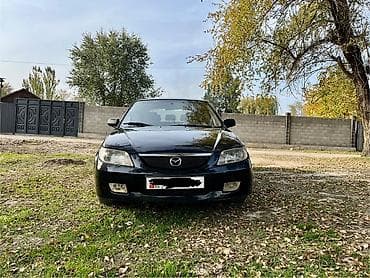 Mazda 323: 2002 г., 1.6 л, Механика, Бензин, Хэтчбэк
