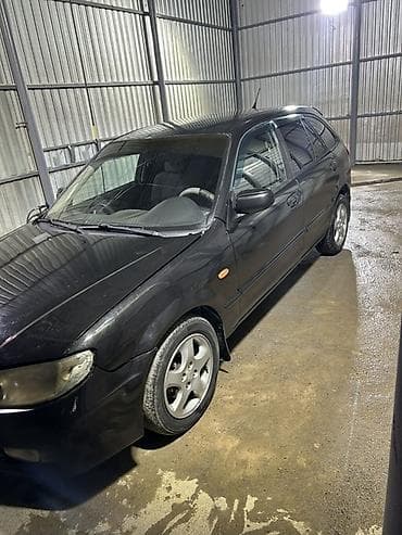 Mazda 323: 2001 г., 1.6 л, Механика, Бензин, Хэтчбэк