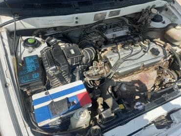 доставка аккумулятора бишкек: Просторный минивэн белого цвета с рейлингами на крыше — 11