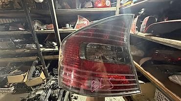 задний подфарник: Задний фонарь (левый) для Chevrolet Aveo (седан, кузов T250/T255) — 1