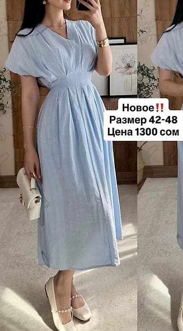 Платье миди небесно‑голубого цвета. - Свободный крой с акцентом на — 1