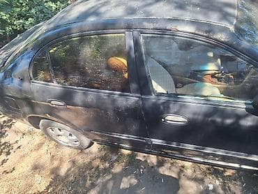 Daewoo Magnus: 2000 г., 2 л, Кол менен иштөөчү, Бензин, Седан — 4