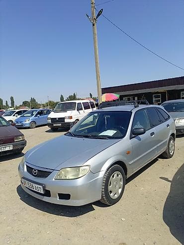 выбор номера о: Mazda 323: 2002 г., Механика, Бензин, Универсал — 3