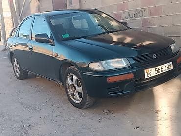 Mazda 323: 1996 г., 1.8 л, Механика, Бензин, Седан — 2