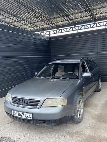 Audi A6: 1999 г., 2.4 л, Механика, Газ, Универсал