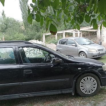 mazda 326: Opel Astra: 2002 г., 1.6 л, Механика, Бензин, Универсал — 1