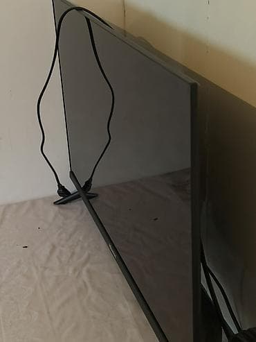 redmi note 5: Телевизор Hisense, диагональ около 32–40". Узкие рамки, две устойчивые — 5