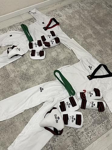 форма теквандо: Комплект для тхэквондо Daedo. Состав: - Добок Daedo (куртка с — 3