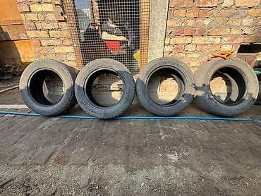 Комплект из 4 зимних шин без шипов. Характеристики: - Размер: 215/60