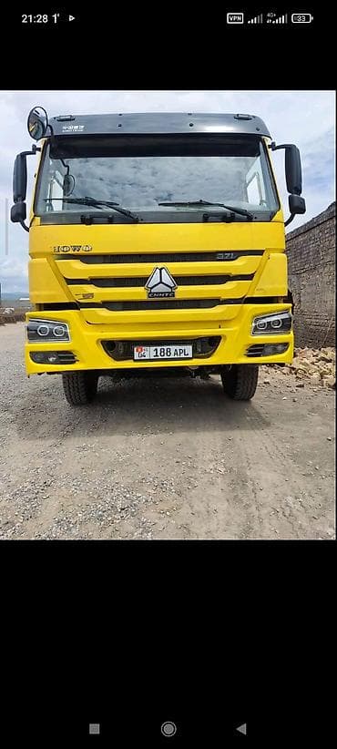 экскаватор w60: Самосвал Howo (CNHTC) 371, желтый. - Колесная формула 6x4. - Мощность — 1