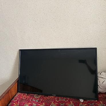 smart tv g7000: Телевизор Samsung, диагональ примерно 32–40". Плоская LED‑панель с — 1