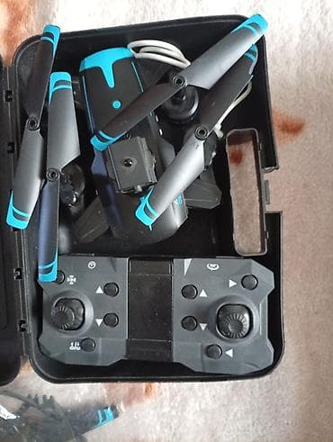 Складной квадрокоптер с пультом ДУ и комплектом аксессуаров в кейсе