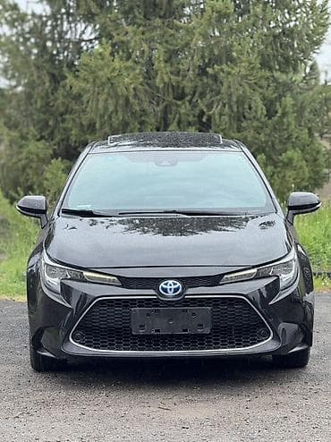 Toyota Corolla: 2019 г., 1.8 л, Вариатор, Гибрид, Седан