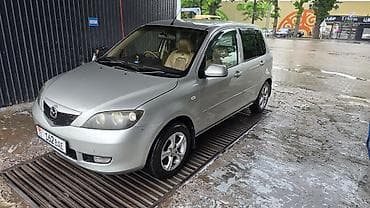 с моей доплатой: Mazda Demio: 2004 г., 1.3 л, Бензин — 3