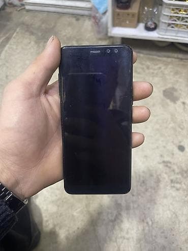 телефон 9: Samsung Galaxy A8 2018, Б/у, цвет - Черный, 1 SIM — 1