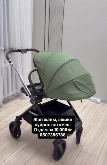 коляса: Детская прогулочная коляска Kidilo, цвет хаки/зеленый. Особенности: - — 2