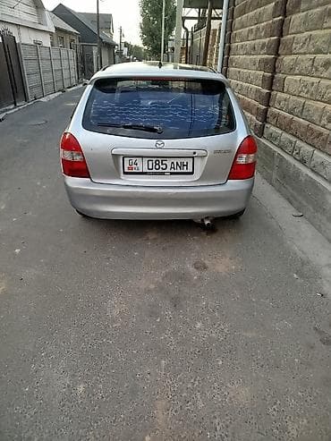 2000: Mazda 323: 1999 г., Механика, Бензин, Универсал — 4