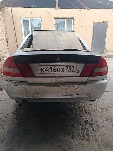 matiz diska: Mitsubishi Carisma: 1994 г., 0.1 л, Механика, Бензин, Седан — 3