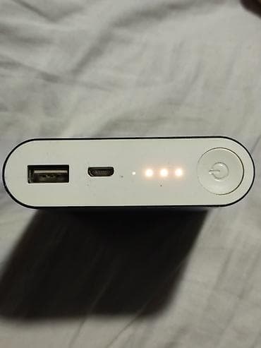 повербанк 10000 mah цена: Xiaomi Mi Power Bank 10400 мАч - Емкость: 10400 мАч (37,44 Wh) - — 2