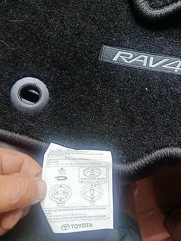 асфальт рез: Оригинальные коврики салона Toyota RAV4 - Комплект текстильных — 1