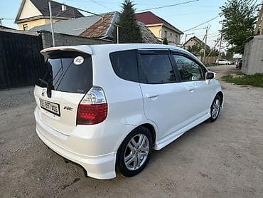 титан на фит: Honda Fit: 2003 г., 1.3 л, Вариатор, Бензин, Хэтчбэк — 4