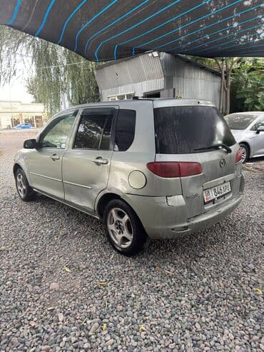 машина самара: Mazda Demio: 2003 г., 1.3 л, Автоматтык, Бензин, Универсал — 5