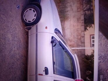 дом на кол: Белый компактный седан/хэтчбек класса B (5‑дверный). Практичный — 2