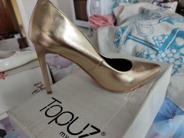срочно в связи с переездом: Продаются новые туфли золотистые. Черных и белых уже нет. Турция — 2